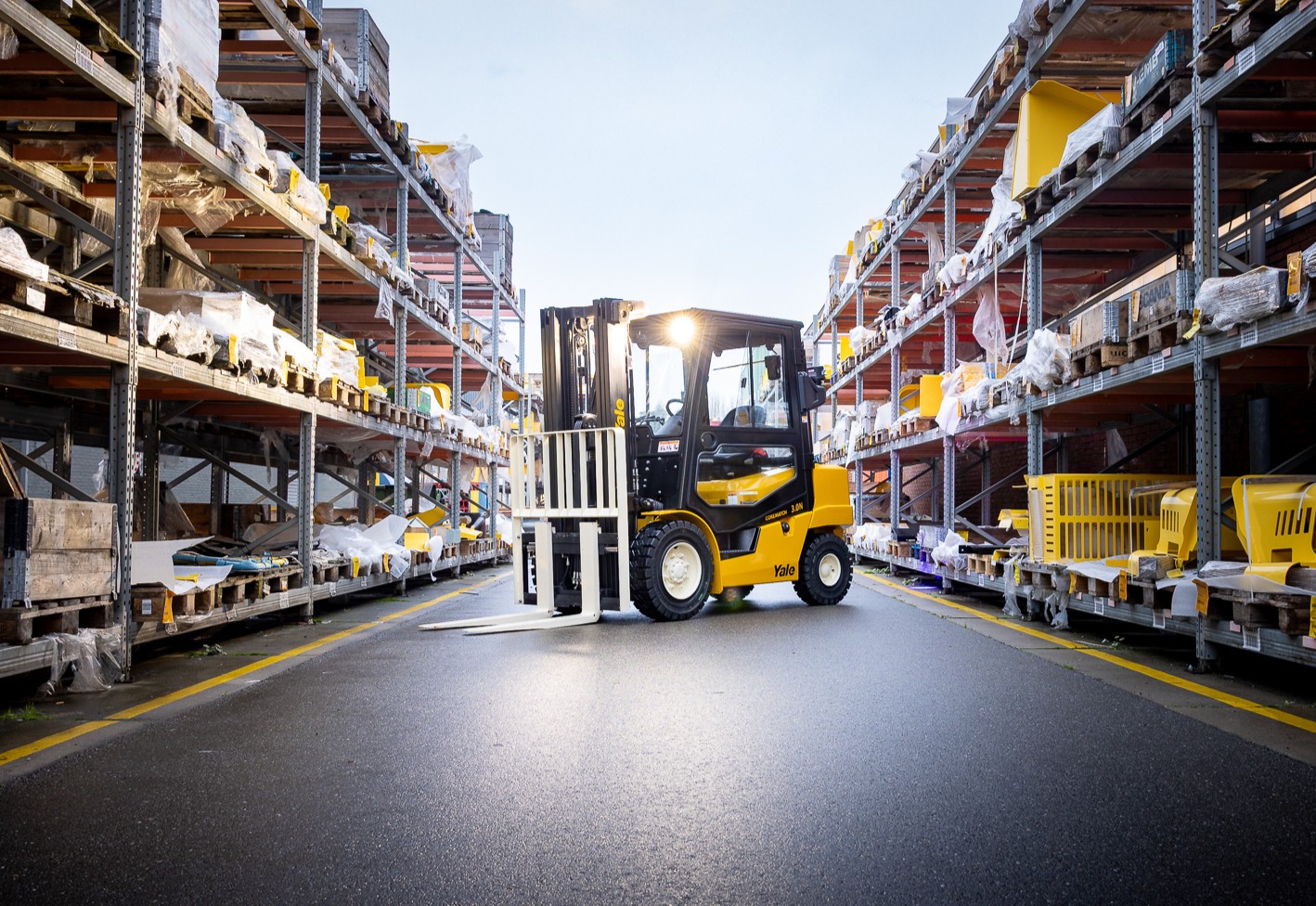 Black and yellow Yale Forklift NZ outside in racking